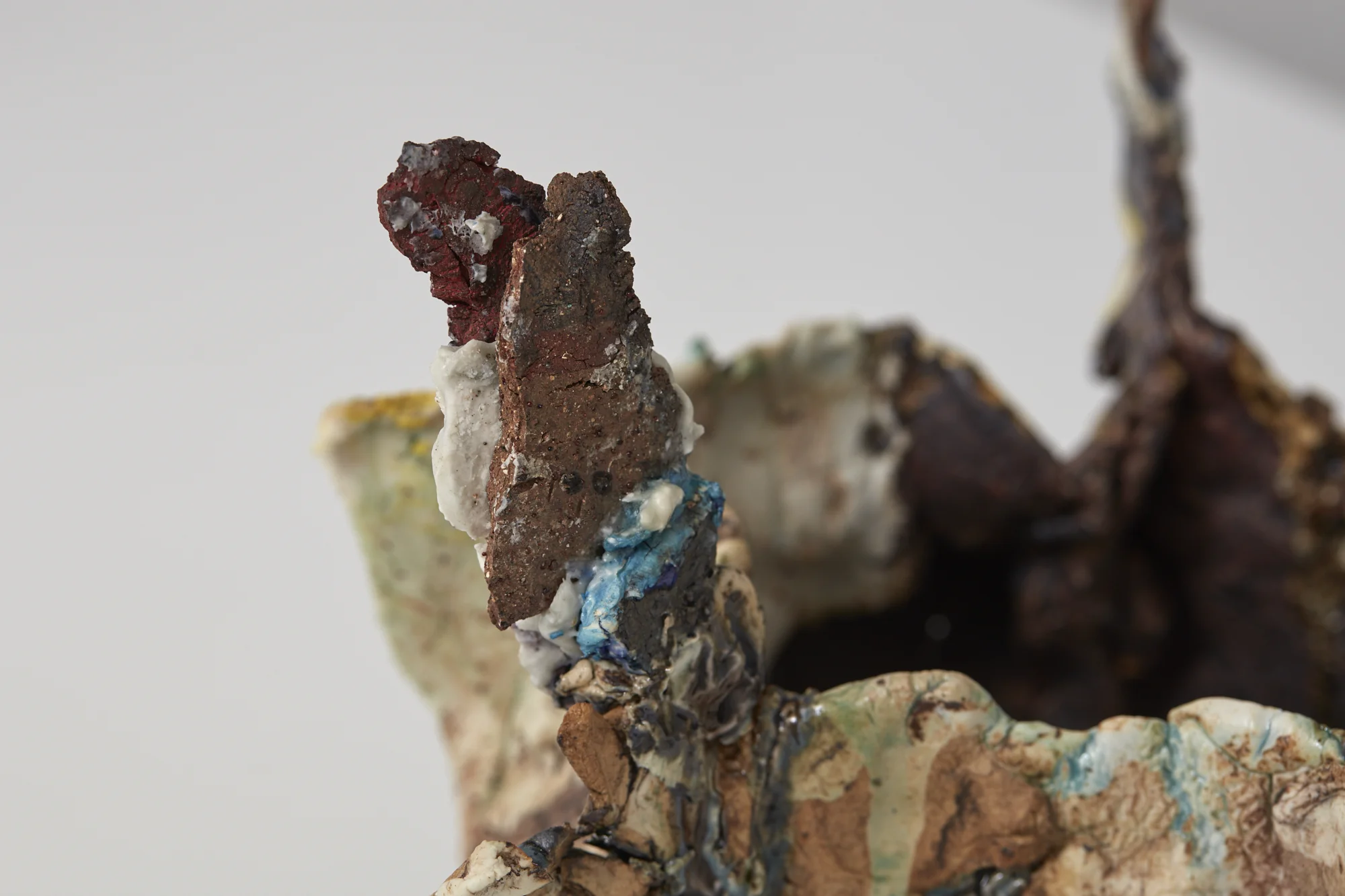 Six Point Pot (detail) 2017 porcelain, raw clay, ceramic pigment and oxide, glass, ceramic scraps 195 x 320 x 230mm