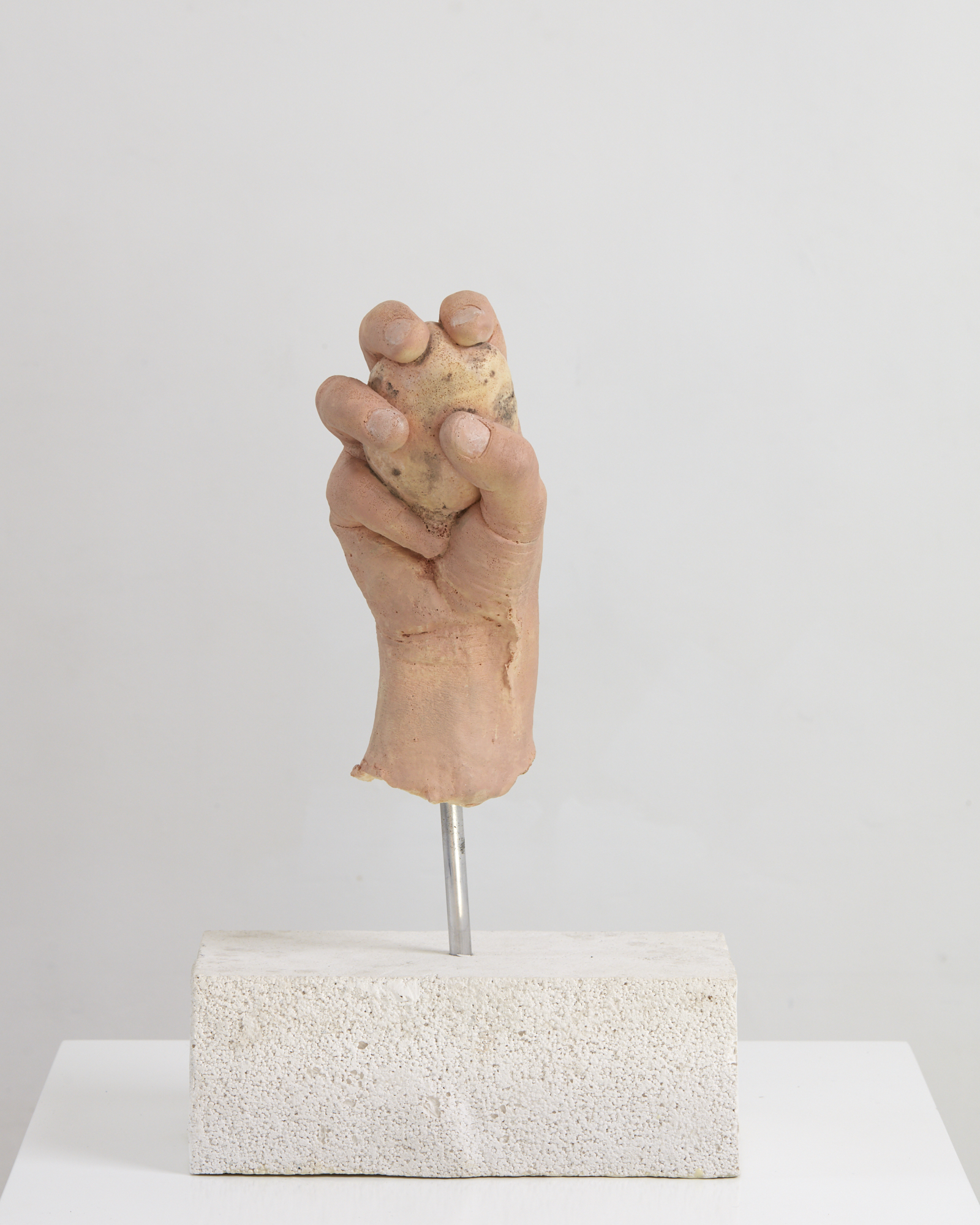 Ronnie van Hout Hand with Potato 2017 cast urethane, acrylic, cast Forton MG, fibreglass, aluminium 360 x 240 x 130mm