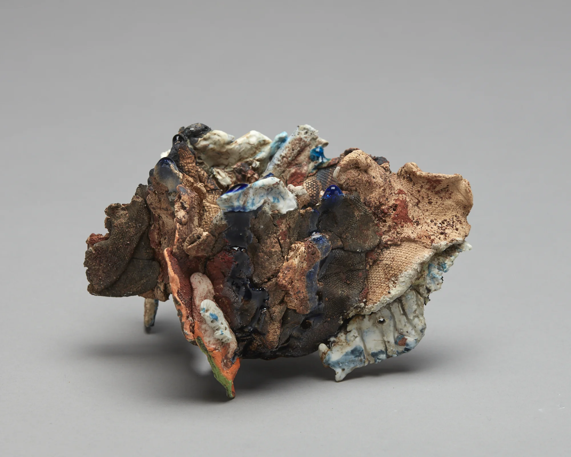 First Pretty Pot 2018 raw clay, stoneware, porcelain, ceramic pigment and oxide, glass, wire, mesh 100 x 160 x 120mm