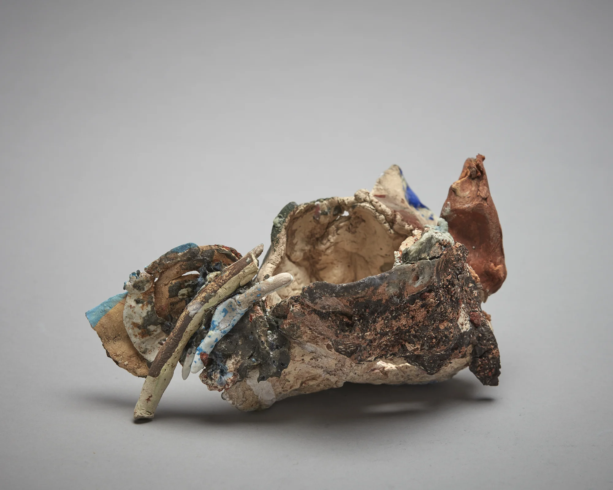 Pretty Pot II 2018 raw clay, stoneware, porcelain, ceramic pigment and oxide, glass, sand 80 x 160 x 110mm