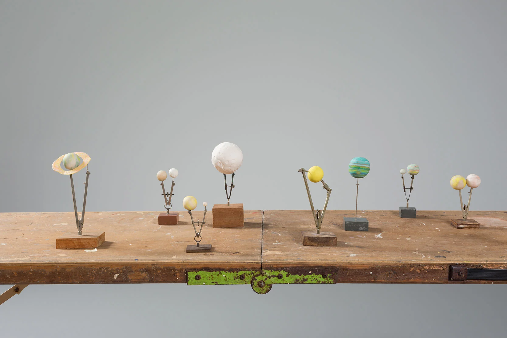 Planets in the Detrimental Signs (detail) 2003 compasses, polymer, wood, paint, resin, copper, found table ( Jealous Saboteurs , MUMA, Melbourne, 2016)