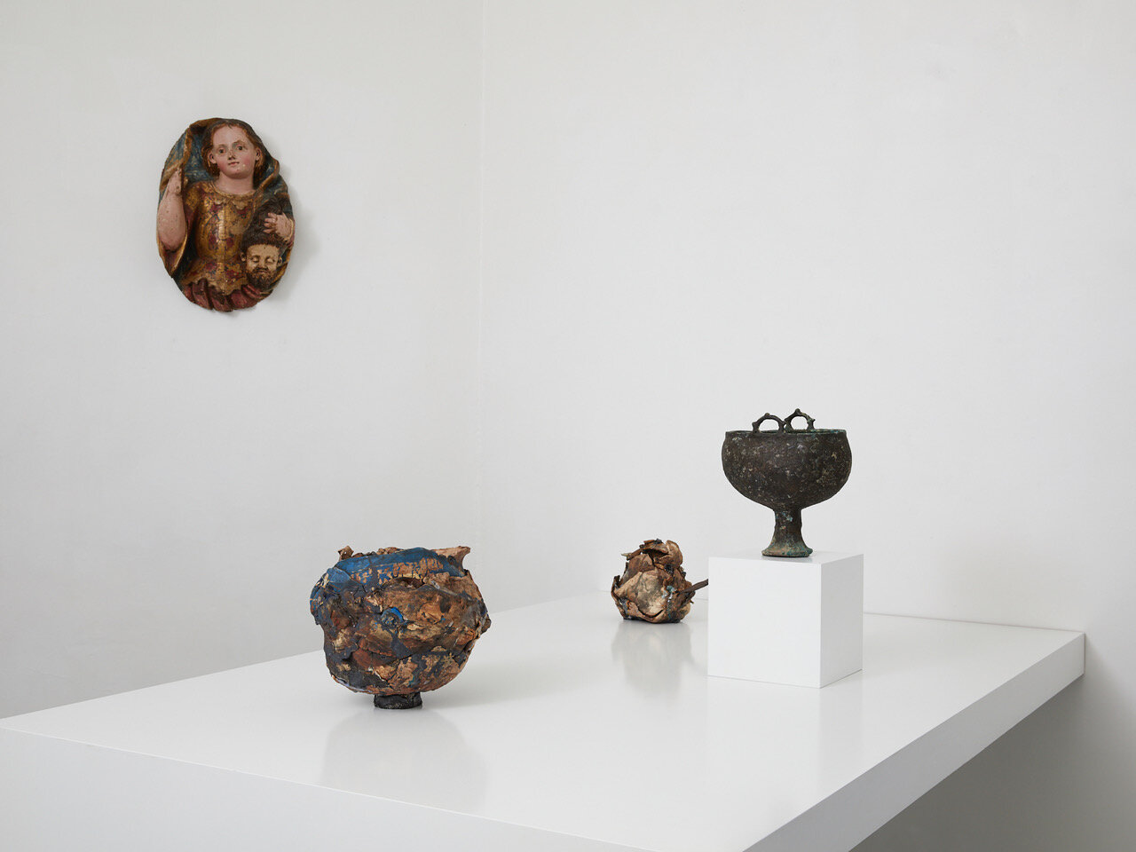 Left to right: Judith 18th century, Spain or a Spanish colony (possibly Equador) 480 x 330 x 170mm Tanja Nola Royal Blue Velvet Pot 2019 raw clay, stoneware, earthenware, porcelain, ceramic pigment and oxide, glass, copper, diamond dust,