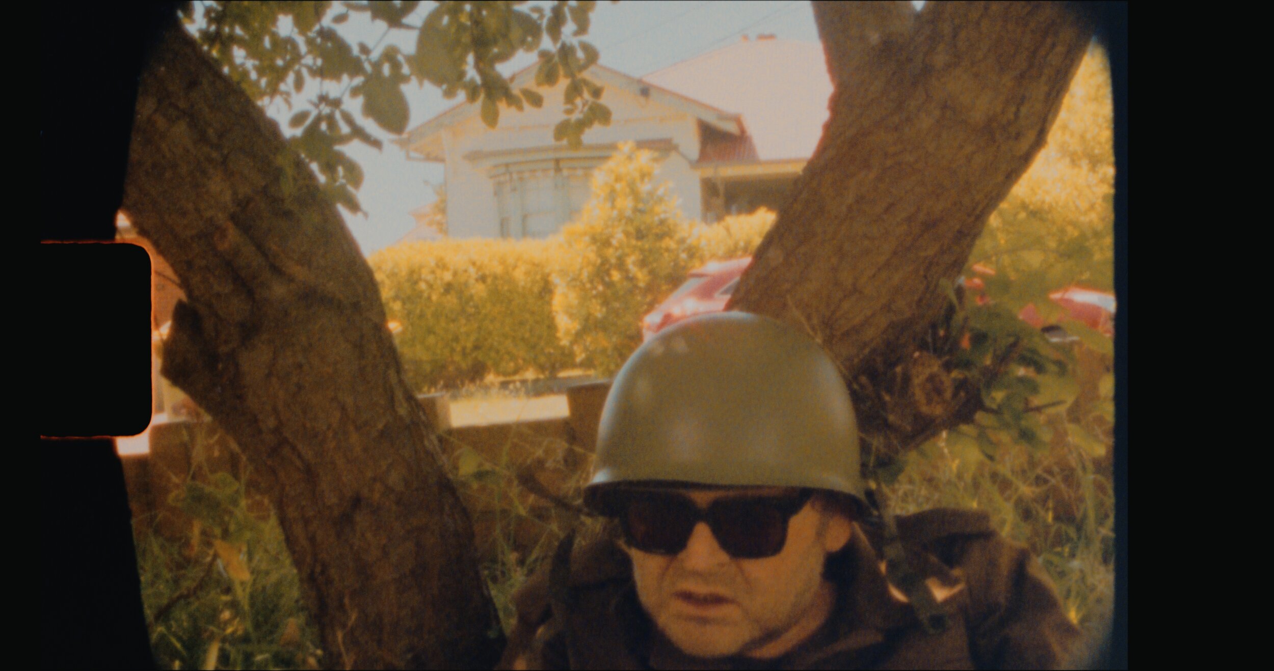 Ghosting (The Garden) (still) 2020 single channel video (colour/sound), 12:50:00mins, Super 8 film scanned to 4k digital, edition of 3 + 1 AP Text by Theo van Doesburg, The Other Face to be , De Stijl magazine, Vol XIII (1926), pg 64 Music