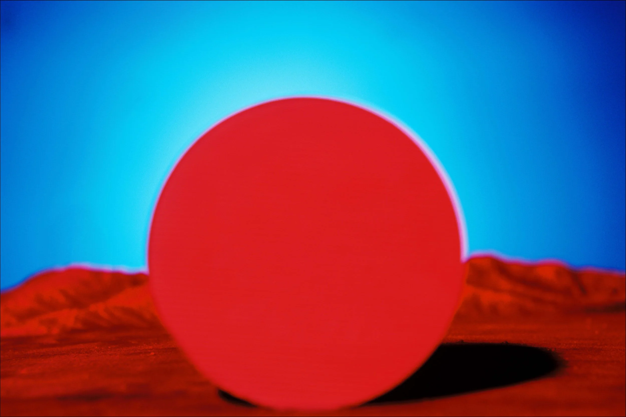   Red disc and landscape  2024 Cibachrome on aluminium, ed. 3 + 1 AP 600 x 1000mm 