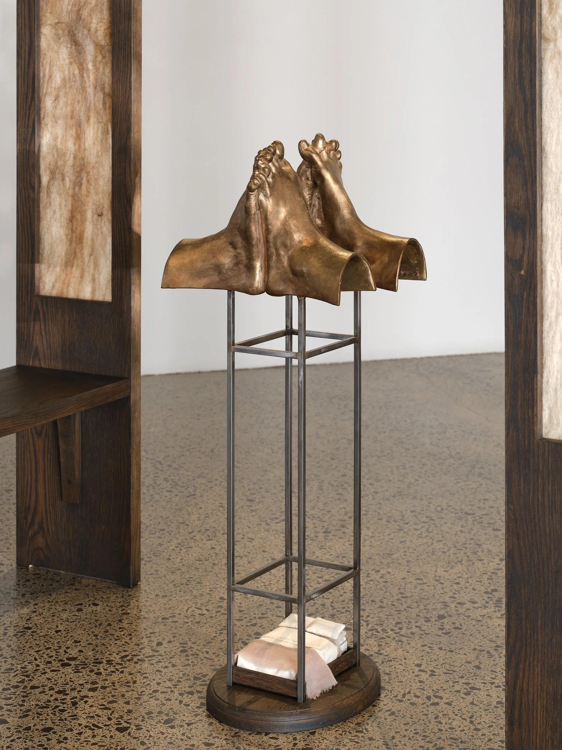   Apology  (detail) 2025 American oak, brazed steel, cast bronze, felted wool, human hair, cotton  Installation view, Erika Holm, Ngaroma Riley, Tarika Sabherwal -  Echo  Artspace Aotearoa, 2025 Image: Sam Hartnett 