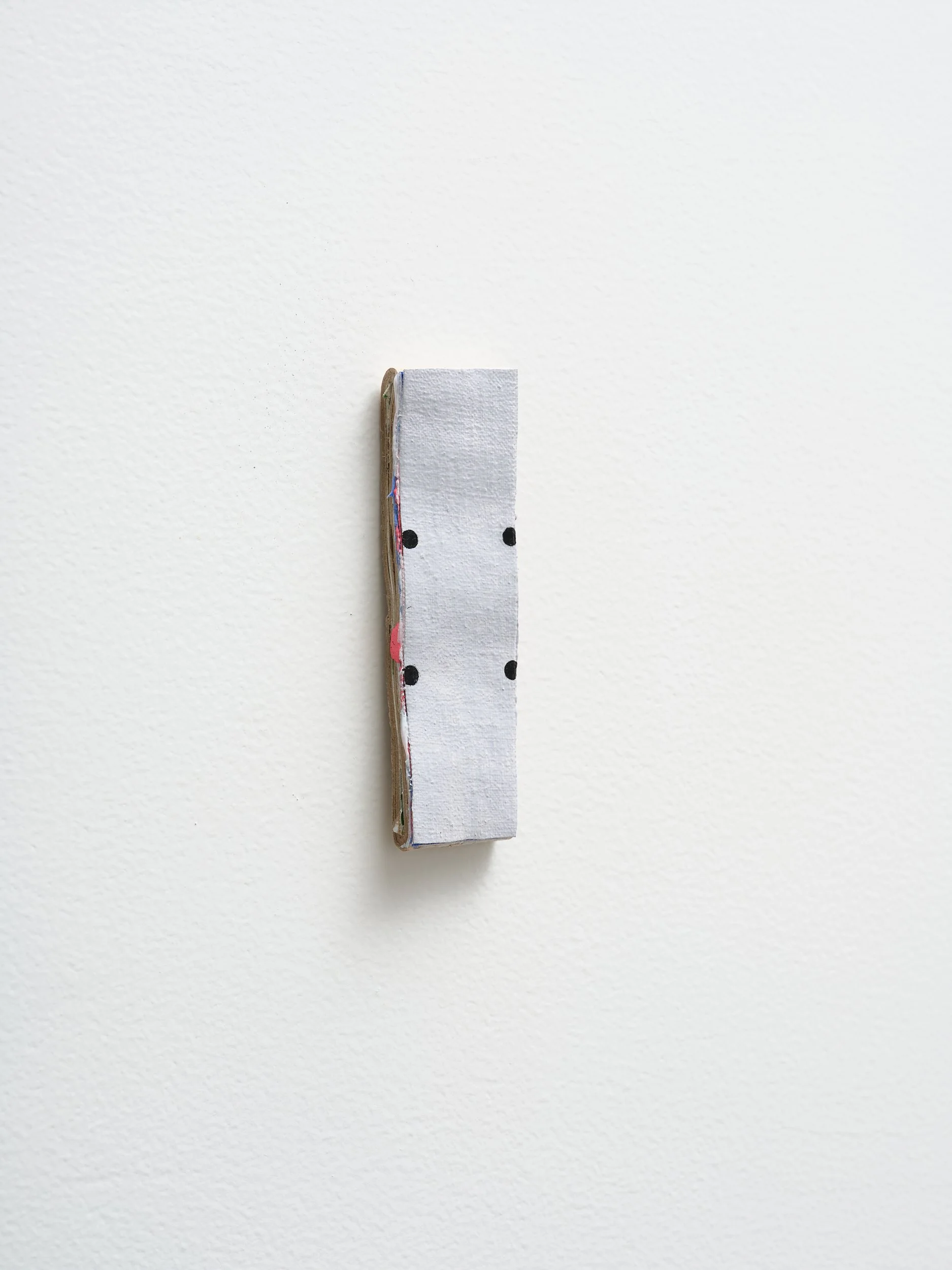   No title   2025 acrylic on canvas and card 130 x 35mm 
