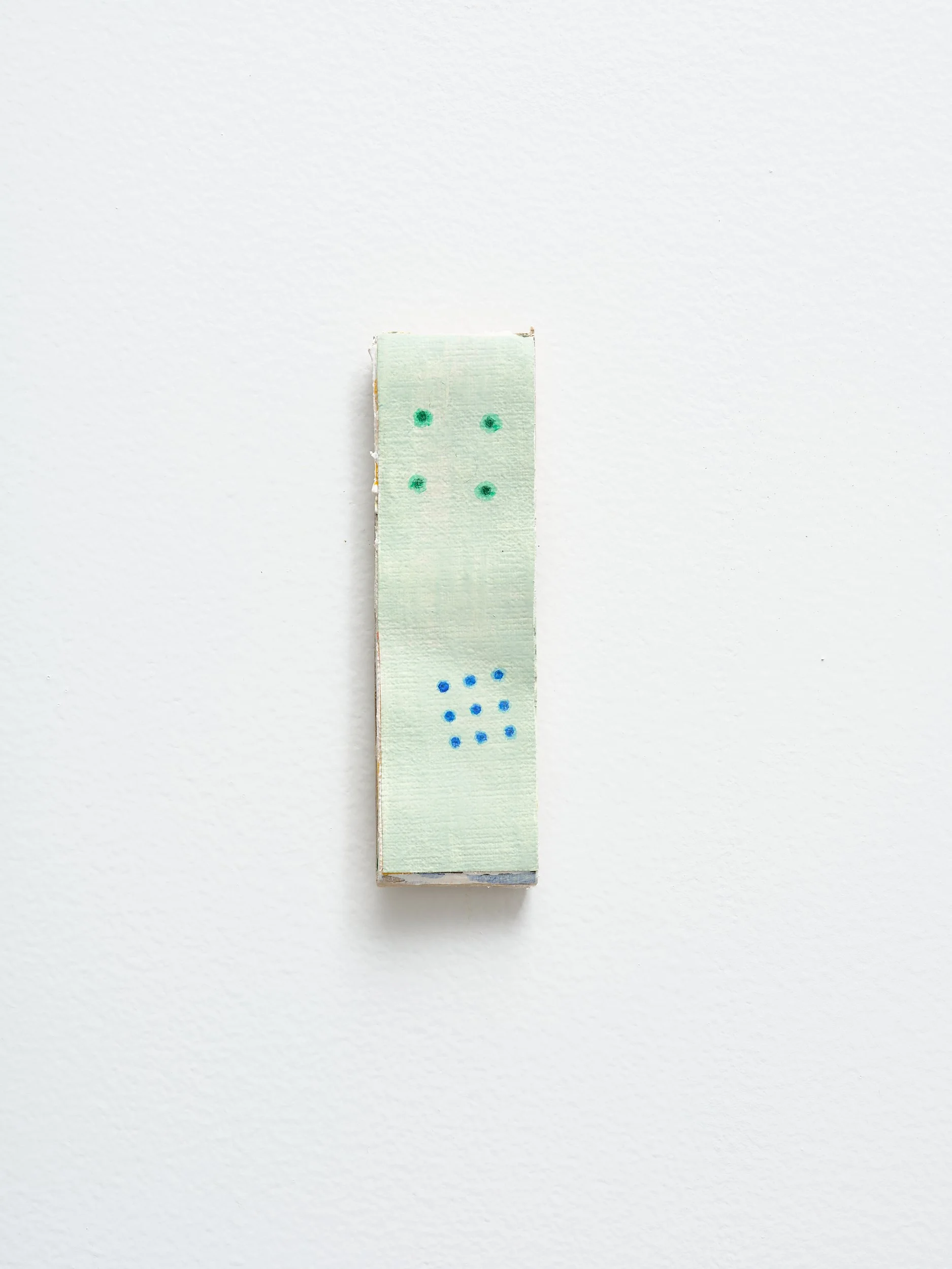   No title   2025 acrylic on canvas and card 130 x 50mm 