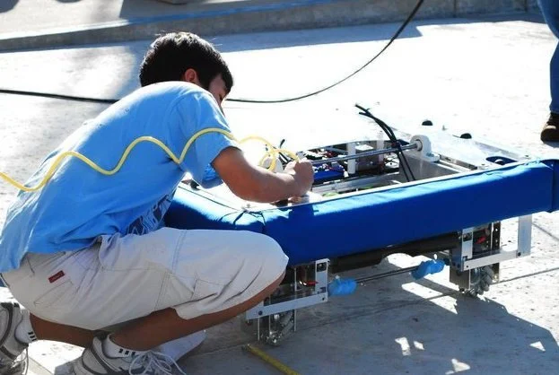 The 2010 FIRST Robotics Challenge was to create a soccer-playing robot. Our solution was to use pneumatic kicking mechanism.