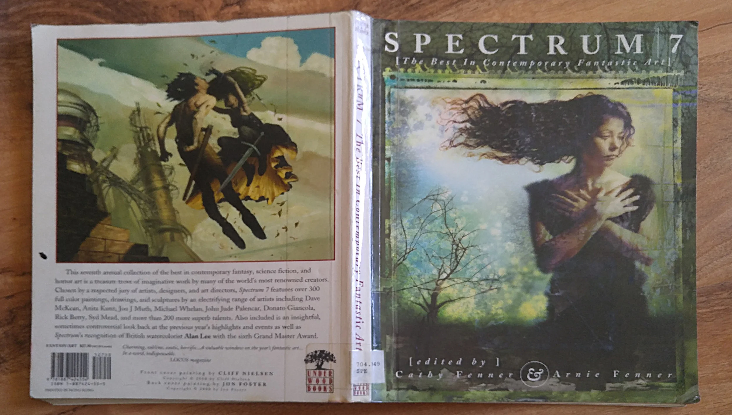 The worn out cover (notice the label left on from the school libraery) 