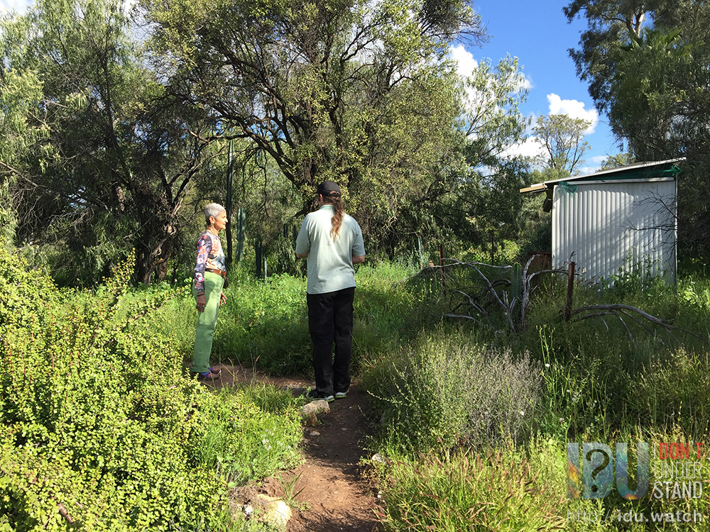 Filming outside Fred's hut. Here, Barbara is discussing the history and demise of the Nettleton settlement, one of the three phases of Lightning Ridge's development, after the Wallangulla township in the early 1900s, and the later Lightning Ridge surveyed town.