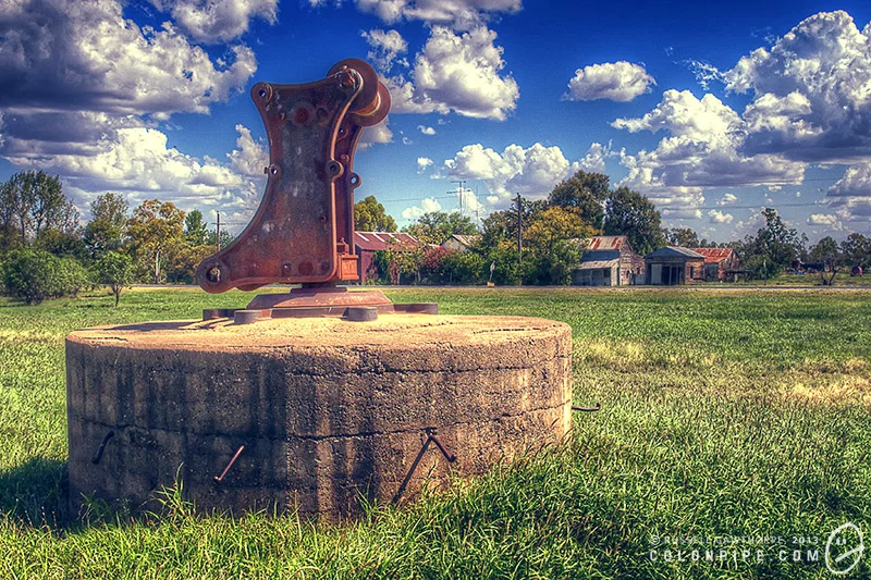 The jib crane base and old farmhouses in Pokataroo.