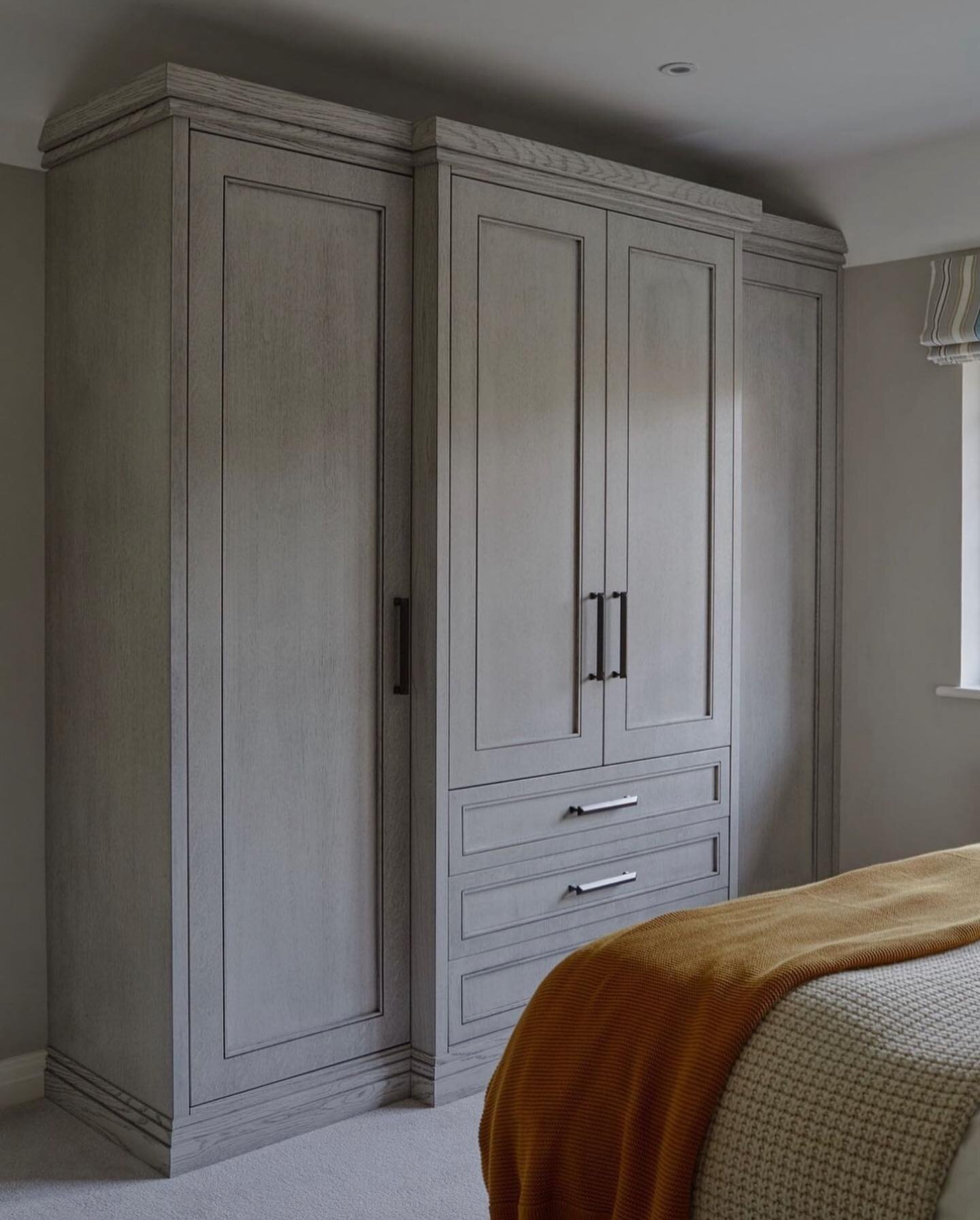 Another angle of the same bedroom. 
The grain of the wood has been enhanced to create a wonderful textured finish on this beautiful bespoke wardrobe.  The details are stunningly simple with clean lines yet add so much warmth to the room.  #rusticchic