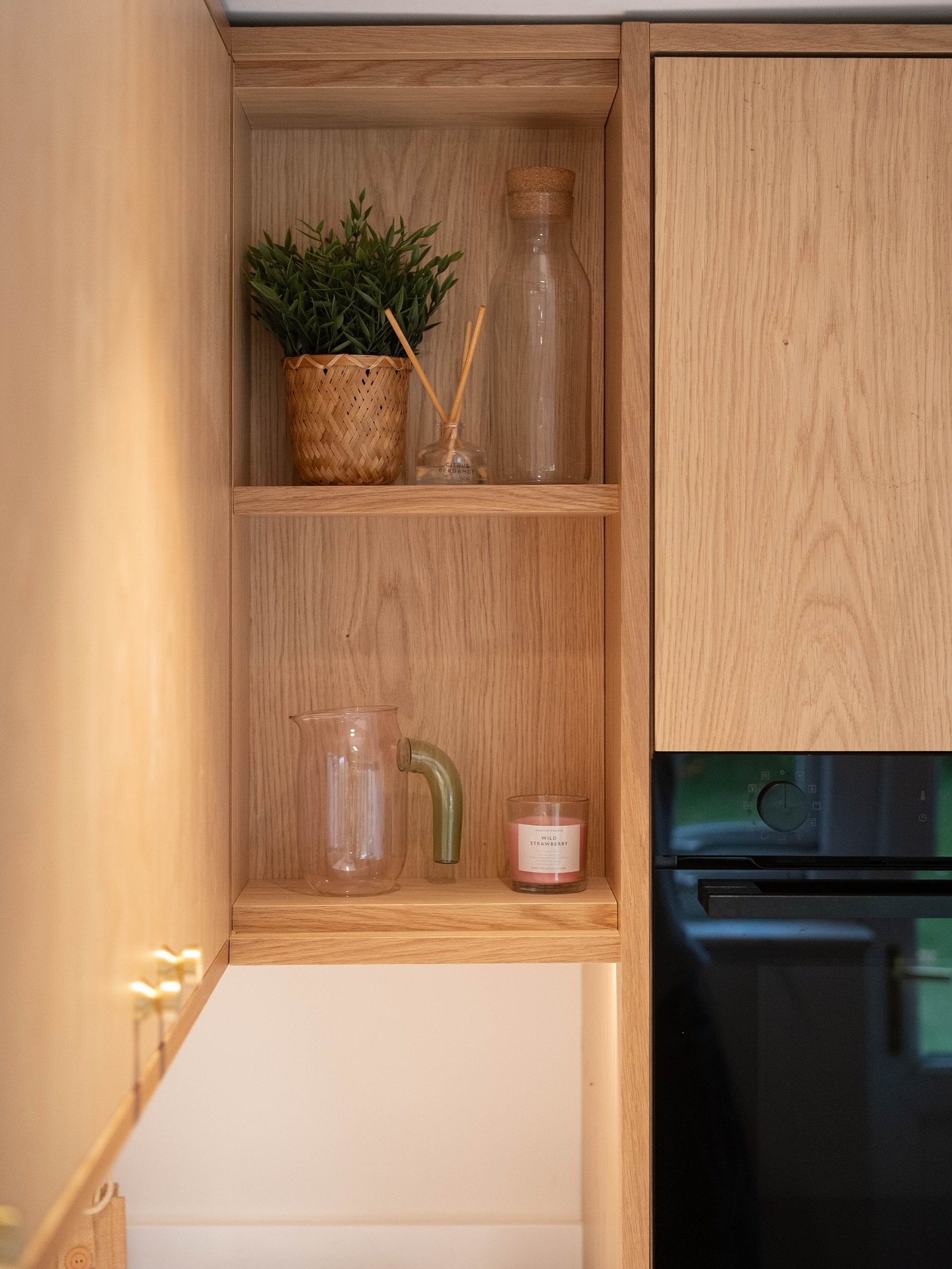 We put a lot of handy storage in this kitchen:

- Units were made 50mm higher with a lower plinth line to maximise storage space
- An open wall unit was put in a tight area where some boxing could only allow a very shallow unit
- Pull out bin unit wi