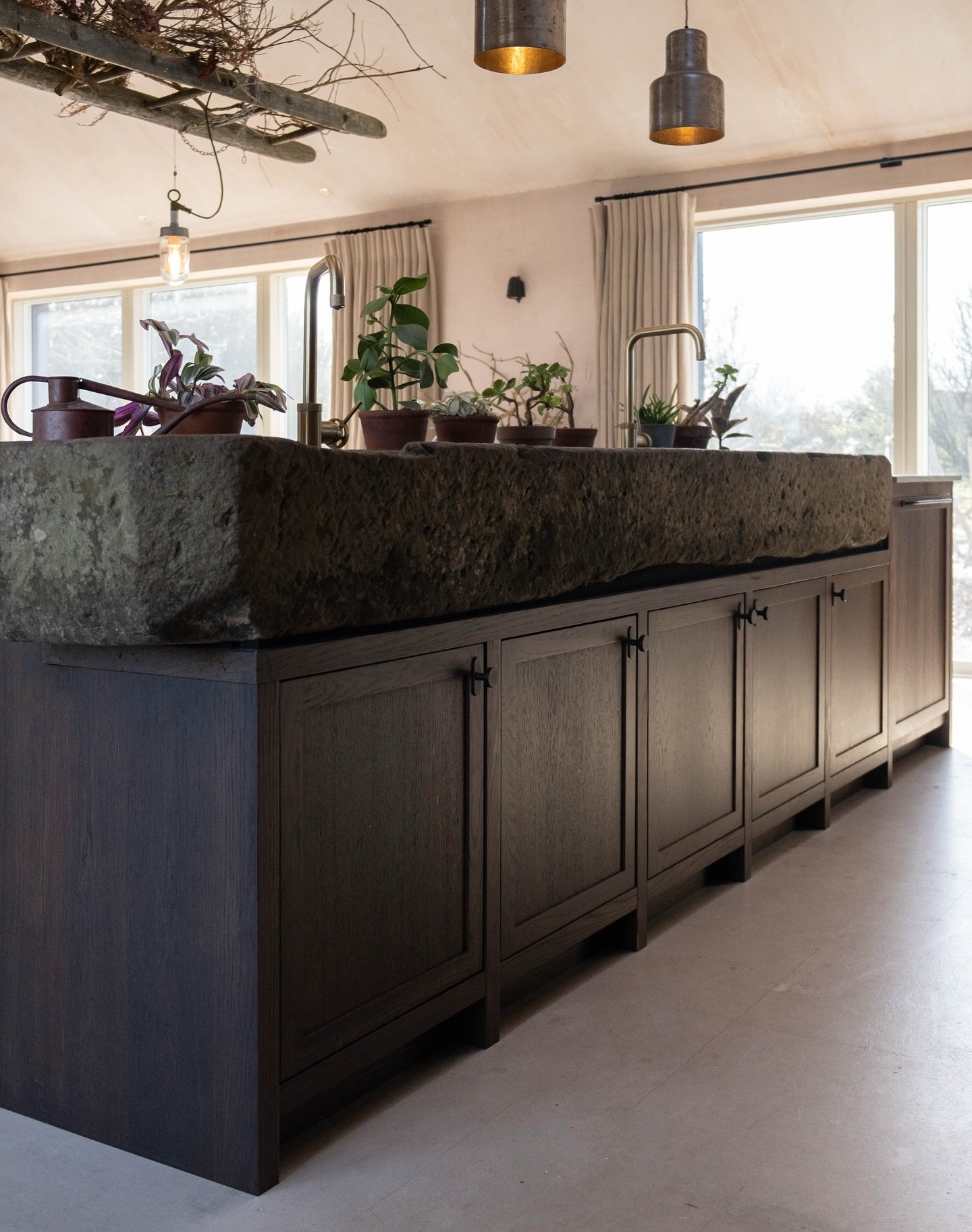This reclaimed granite trough is a great testament to the strength of our cabinetry used in our kitchens. Here we see this trough used as a sink in this beautiful stained oak kitchen. 

#design #supply #install #meadowskitchens #kitchen #kitchendoors