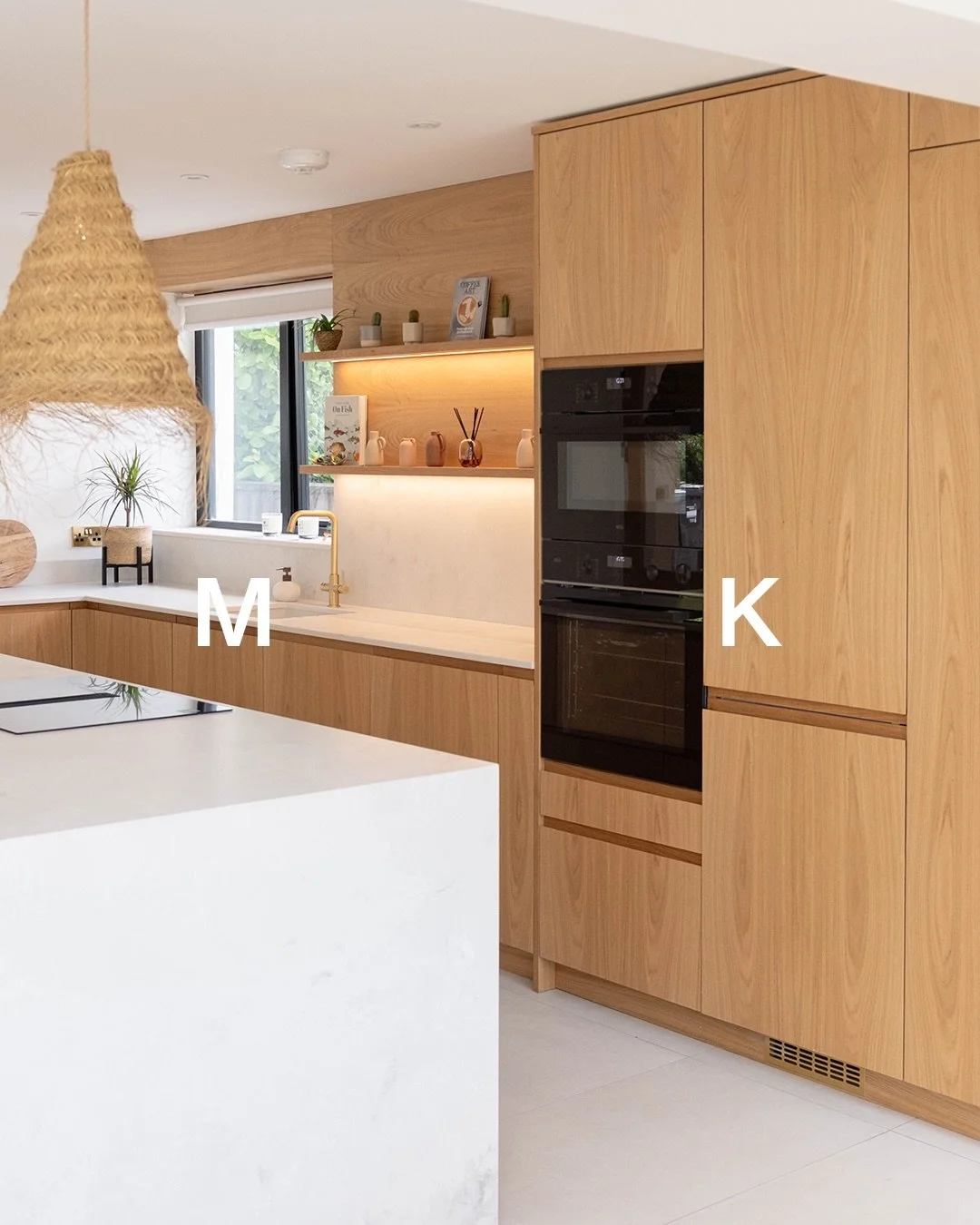 A recently completed project in Carbis Bay.

Some beautiful crown cut oak with a really stunning grain. All the lovely handle details, open units, larder internals, drawers, and cladding all in the same finish making for a really stunning project. 

