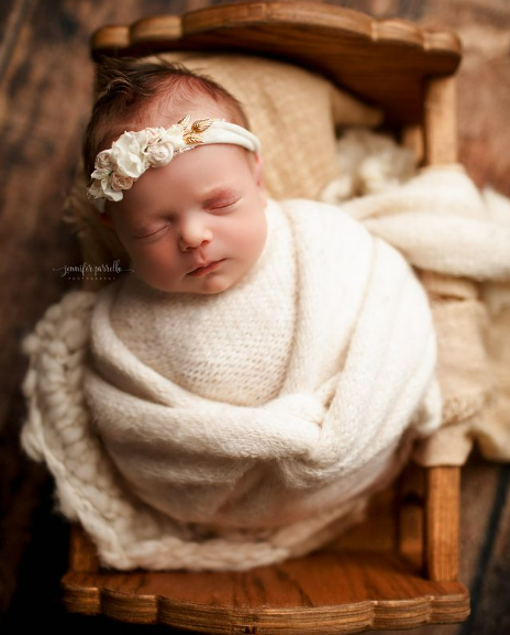 Why Hire a Professional Newborn Photographer?
