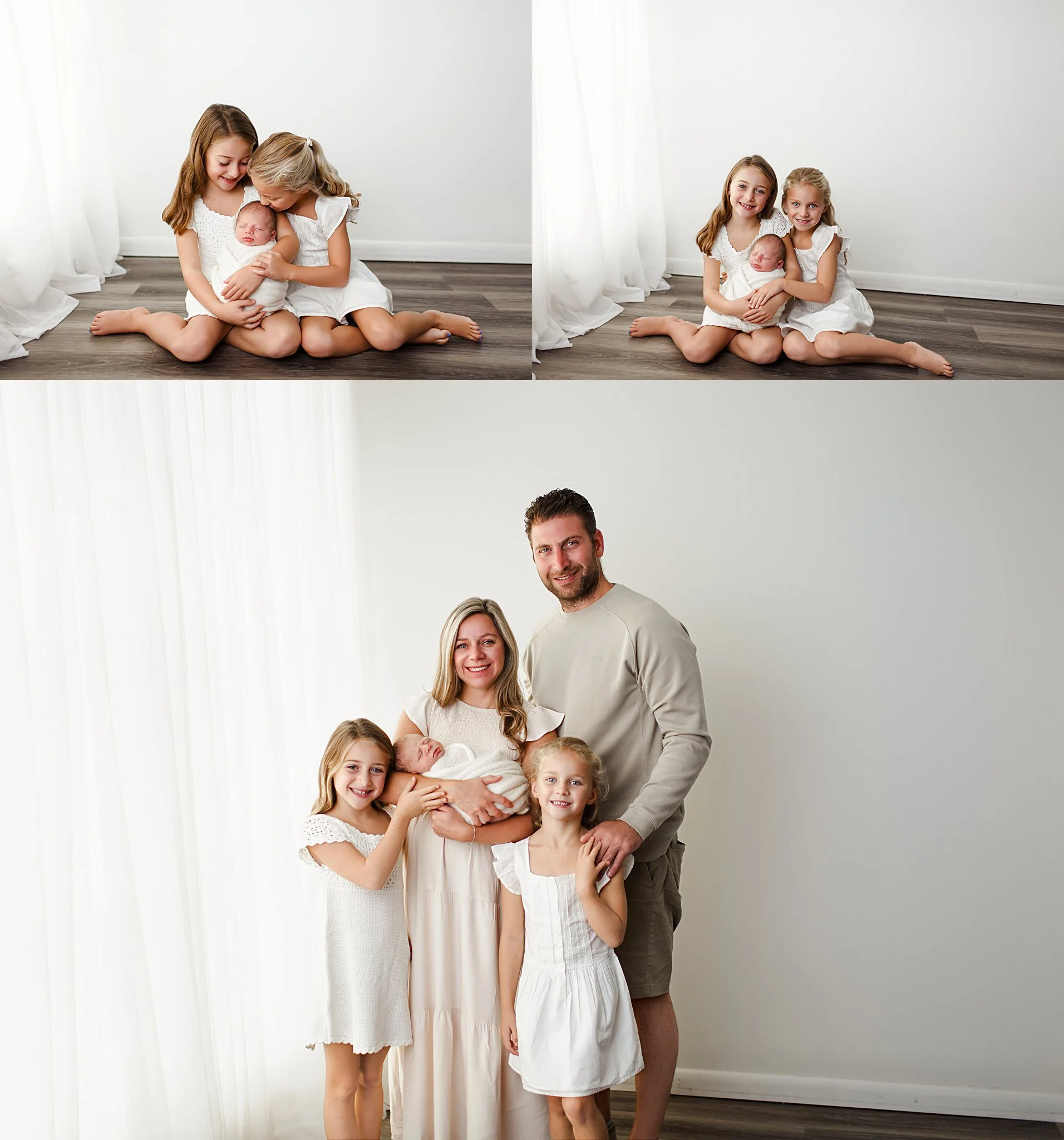 Parents and two little girls pose with their new baby boy against a minimalist, natural light studio backdrop in New Jersey