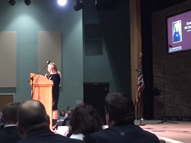 Danielle at MCOE, Caption: Future Farmers of America State Reporter Danielle Diele speaks before three-hundred guests at the Merced County Office of Education Annual Education Report luncheon in Merced. Photo by Steve Newvine