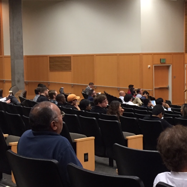Audience members view a student presentation at Innovate to Grow. Photo by Steve Newvine
