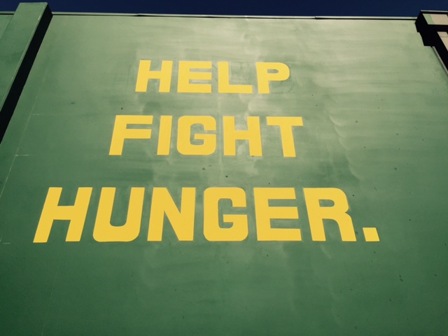 The mural’s message: help fight hunger. Photo by Steve Newvine