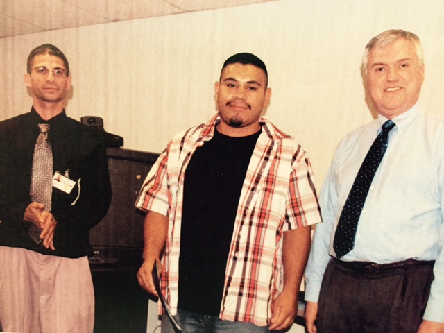 Participants in a youth employment energy efficiency program receive completion certificates. Photo from Merced WIB
