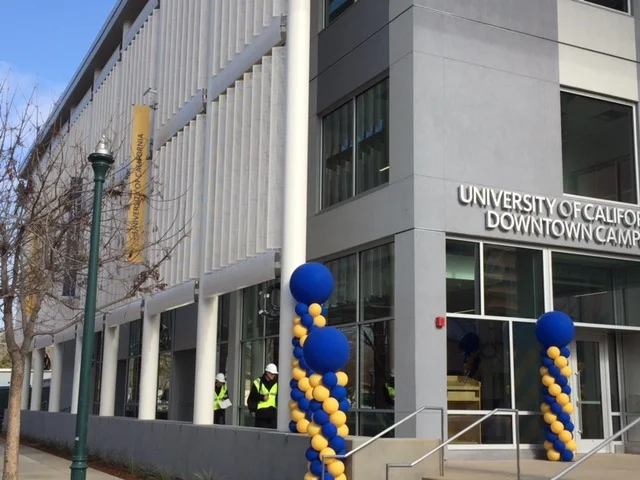 Construction workers checking details as the final touches are being made to the UC Merced Downtown Campus Center. Photo: Steve Newvine