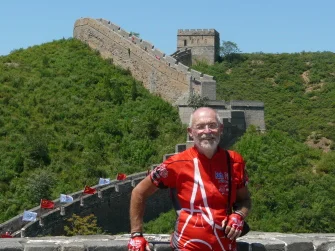 Francois at the Great Wall of China during his 2008 trip with one-hundred other bicyclists that took them from Paris to Beijing. Photo: velo.hennebert.fz