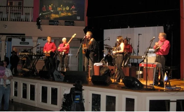 Kim McAbee-Carter on stage with the Buckaroos at the Crystal Palace in Bakersfield from 2009. Photo: 9 From 99-Experiences from California’s Central Valley by Steve Newvine