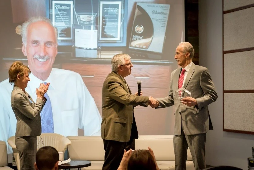 Handing out awards honoring local business people who are making a difference in their communities is all part of my current role. Photo: Newvine Personal Collection