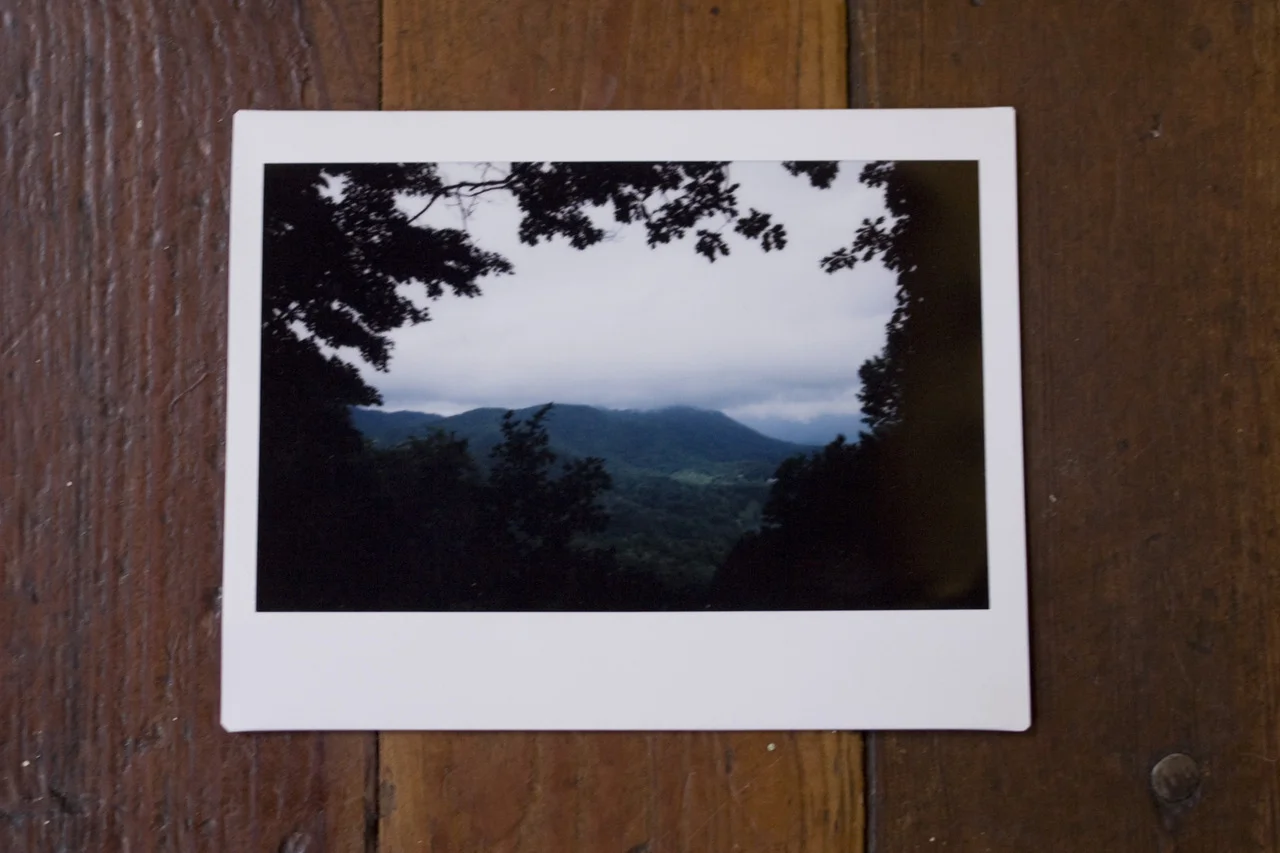 americanguide :
GREAT SMOKY MOUNTAINS, NORTH CAROLINA
Guide to North Carolina Brittany Kearns logs a report for Field Assignment #1: Topography and Climate , on how the Great Smoky Mountains got their name:
The Cherokee Indians have many legends about this area, which was part of their former home. Origin of the name Great Smoky is buried in obscurity, but it was probably suggested to Indians or early settlers by the tenuous mist, a dreamy blue haze like that of Indian summer, or deeper that hovers almost always over the high peaks. Earliest official Government use of the term is in the 1789 act of cession delimiting the boundaries of North Carolina and what is now the State of Tennessee: “… thence along the highest ridge of said mountains to the place where it is called Great Iron or Smoky Mountain.”
— North Carolina: a guide to the old north state (WPA, 1939)
* * *
Brittany Kearns is a Guide to North Carolina. An honorary Southerner, she was born in New Jersey, but now calls rural Chatham County home. She’s got a degree in anthropology, a love for documentary photography and takes film over digital any day. Follow her on Tumblr at thebeekearns.tumblr.com and check out her portfolio at BrittanyKearns.com .
i’m just over the border, but i’ve had this state on my mind a lot lately. from past lives & future ones.