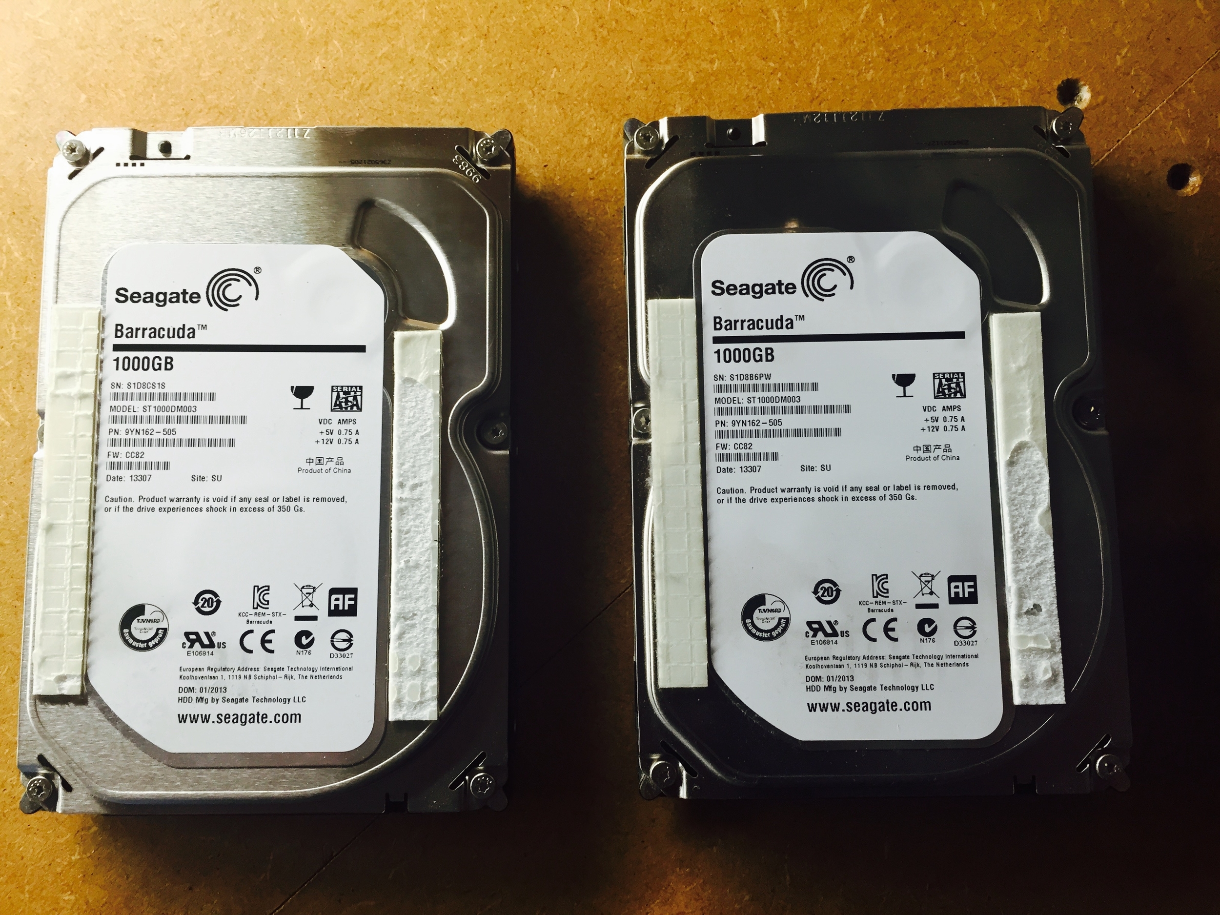 On inspection, one of the ST1000DM003 Drives had a bad head, I imaged the good drive (left one) and used the heads (exact match) in the faulty one in order to get a full image and reconstruct the raid 0 (ext3)
