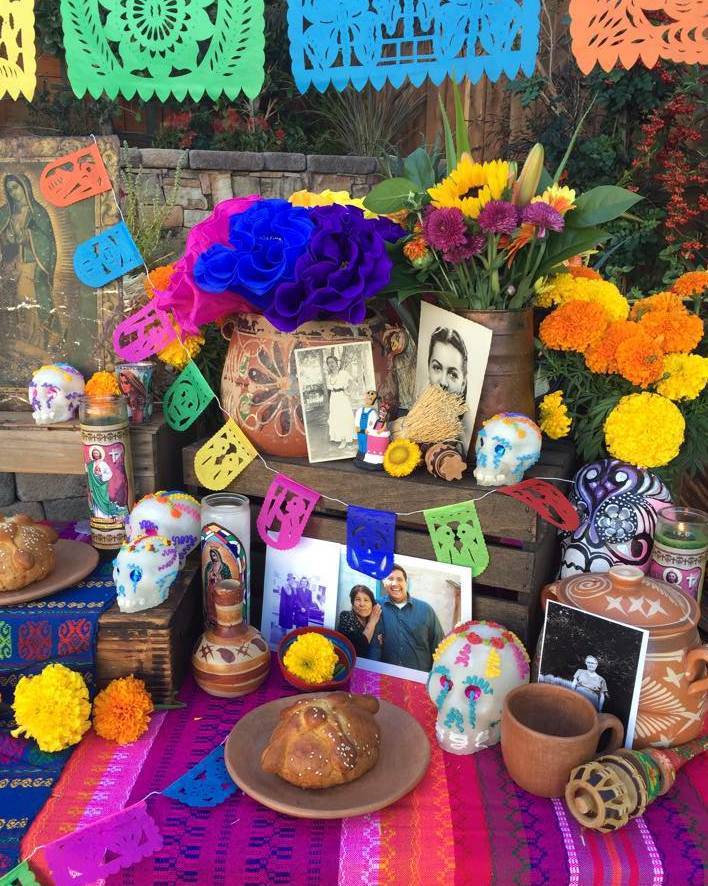 I love how Mexican bean pots, dishes, and molinillos (wooden whisks) are part of this altar’s ofrendas (offerings). Photo courtesy of Casa Artelexia.