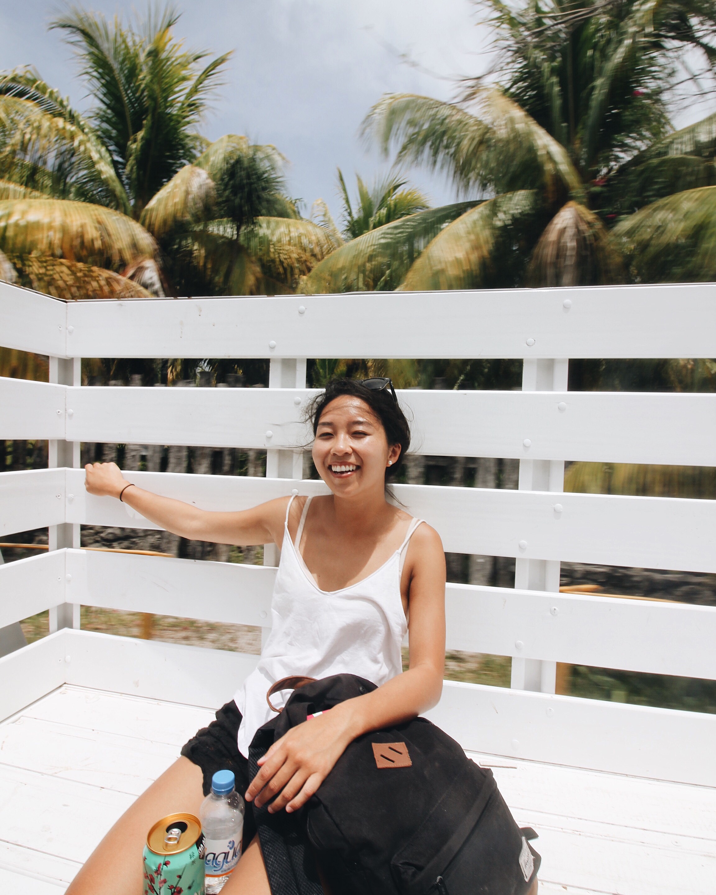 Pictured: Natalie hitchhiking in Tulum. 