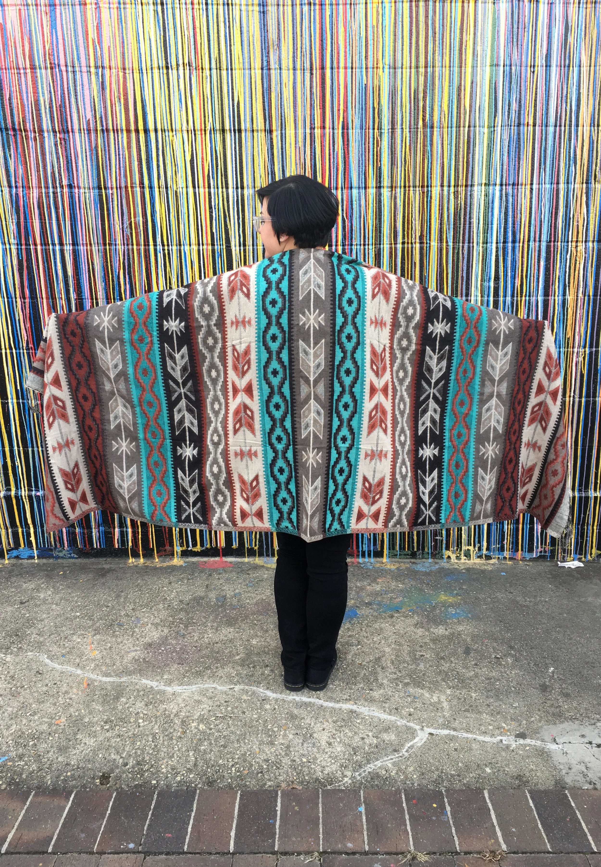 Gina, Angelique's sister, models a Southwest-style shawl. (Photo Courtesy: Angelique Sloan)