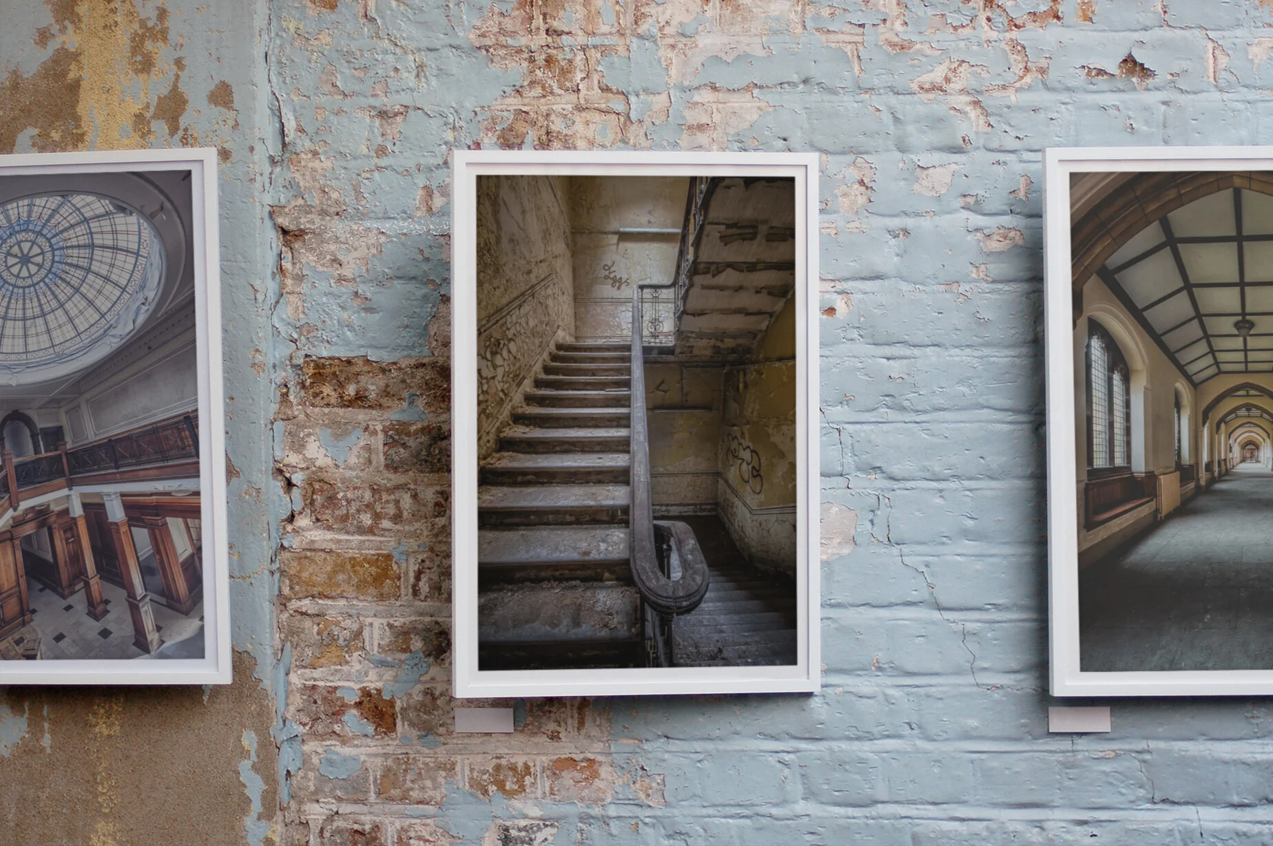 mockup-of-three-poster-frames-against-a-worn-wall-2635-el1.png