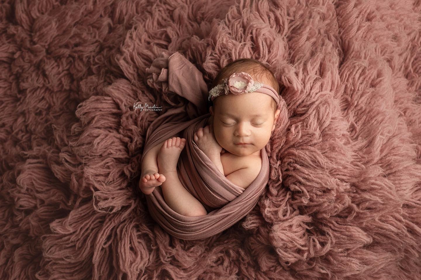 Looking good in pink.  This babe wanted out 8 weeks early and spent some time in the NICU.  But she ate like a boss to gain weight and break out.  Her due date was 2 days ago and she&rsquo;s thriving 💗 #kellymartinphotography #indianapolisnewbornpho