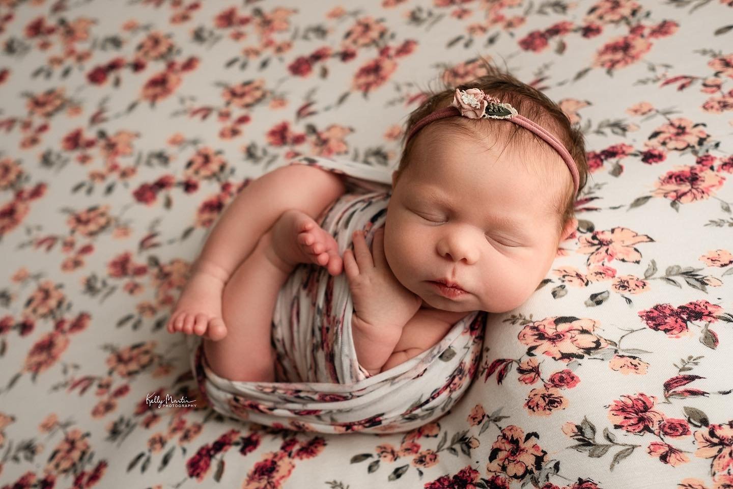 My assistant keeps telling me I need more floral wraps and backdrops.  What do you think? #Kellymartinphotography #indianapolisnewbornphotographer #zionsvillenewbornphotographer #zionsvillephotographystudio