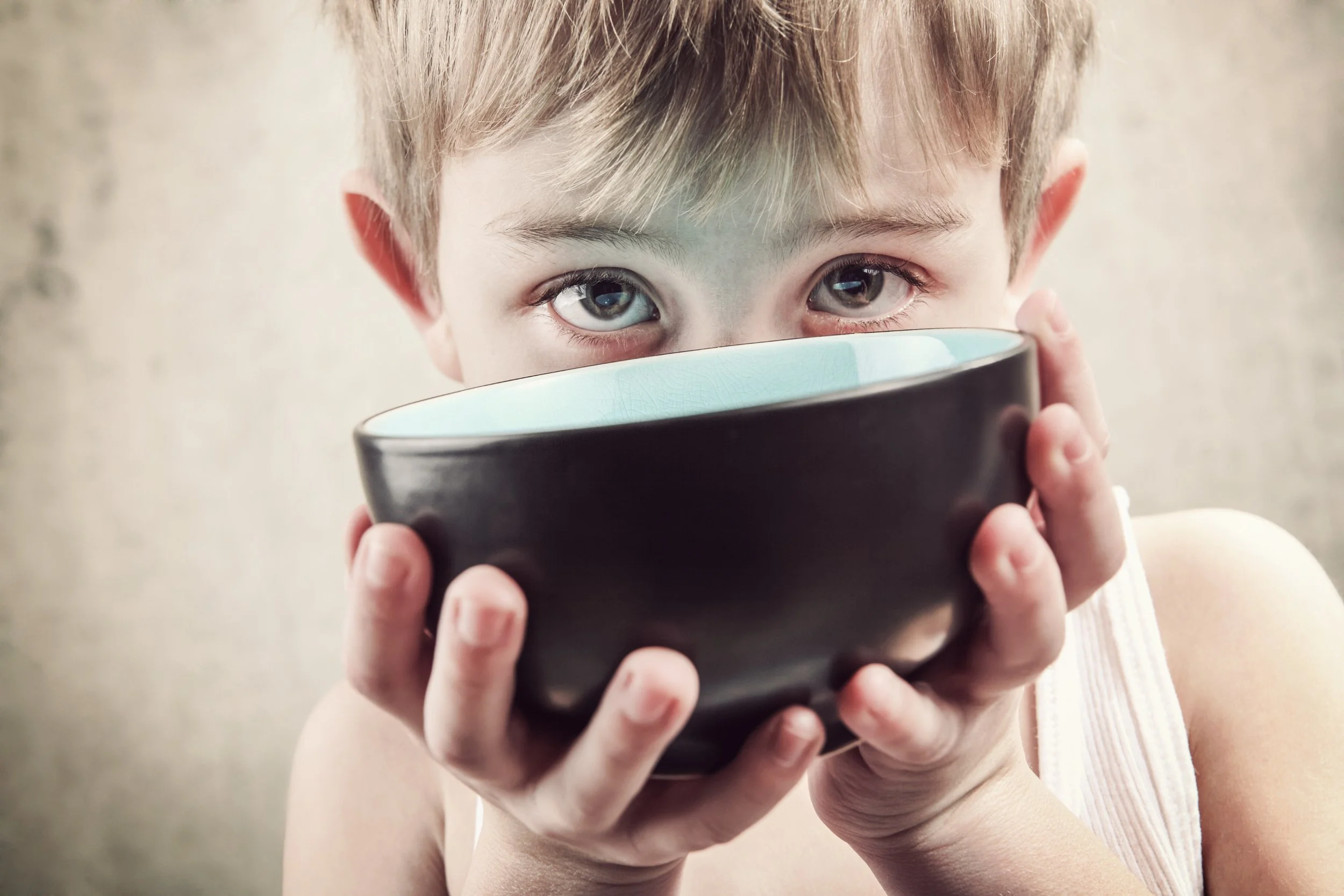 ChildwithBowl_HungerStock.jpeg