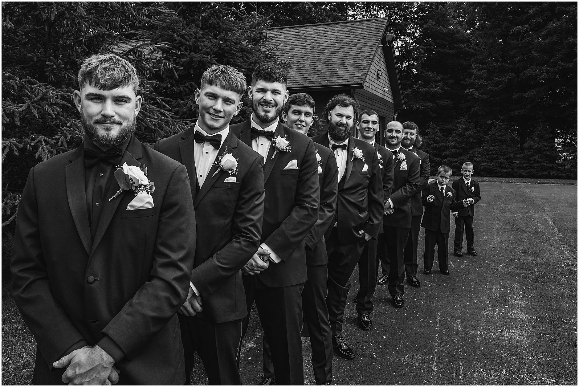Black and white image of the groom and his groomsman as they wait for the spring ceremony to start at a venue in the Catskills.