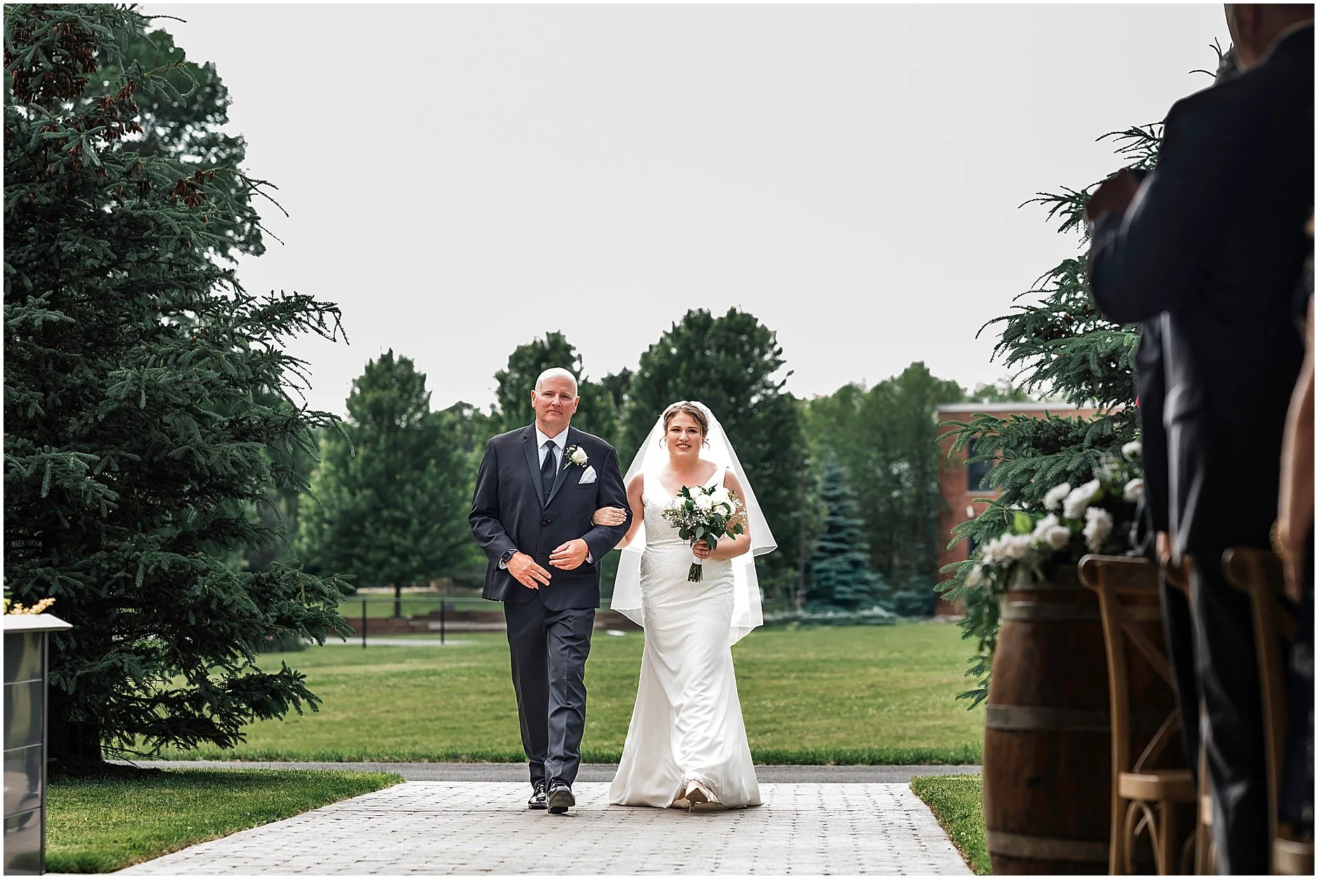 Upstate New York bride walking down the aisle with her dad.