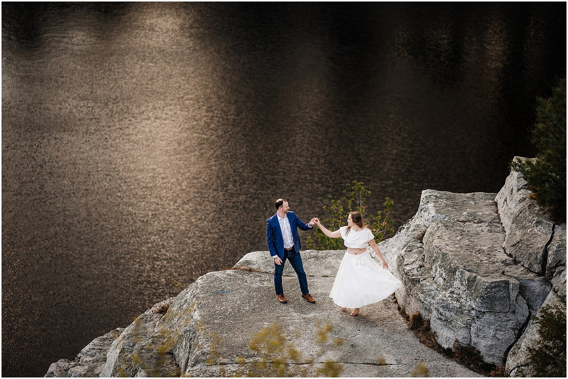 Couple dancing at Minnewaska State Park overlook during Catskills engagement session in New York