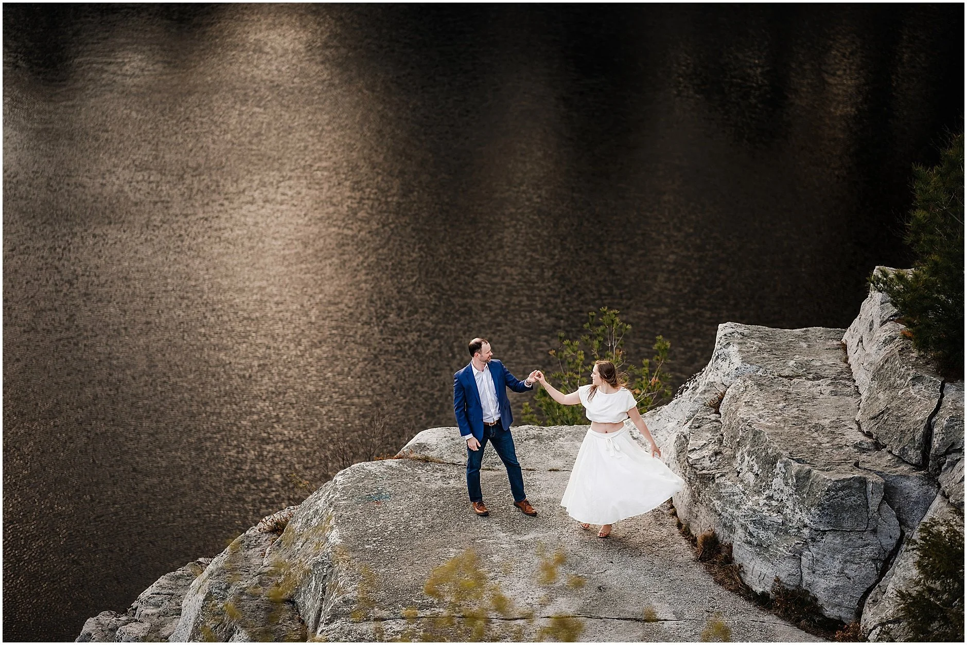 Couple dancing at Minnewaska State Park overlook during Catskills engagement session in New York