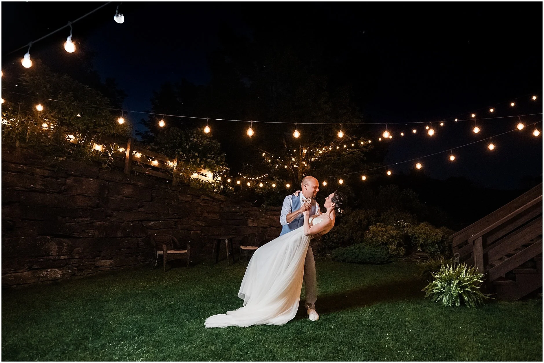 Newlyweds sharing a dance under the starts in the Catskill Mountains