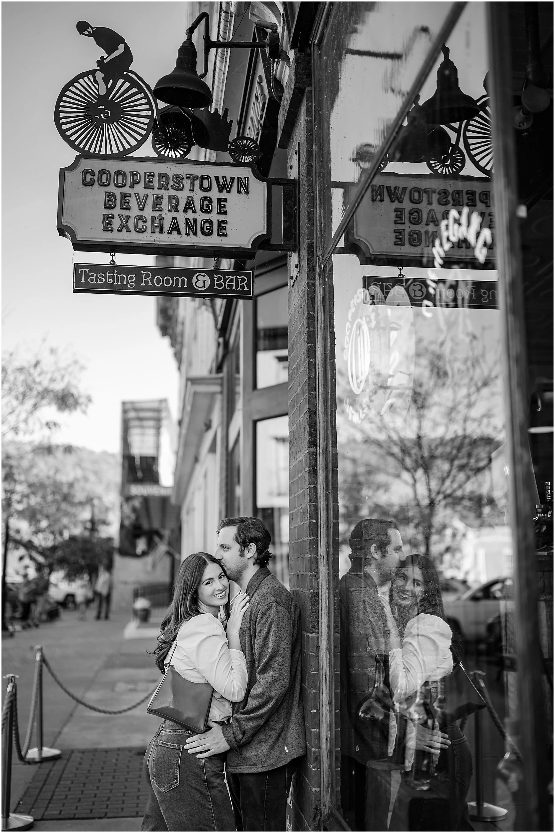 Cozy engagement portraits on Main Street in Cooperstown NY