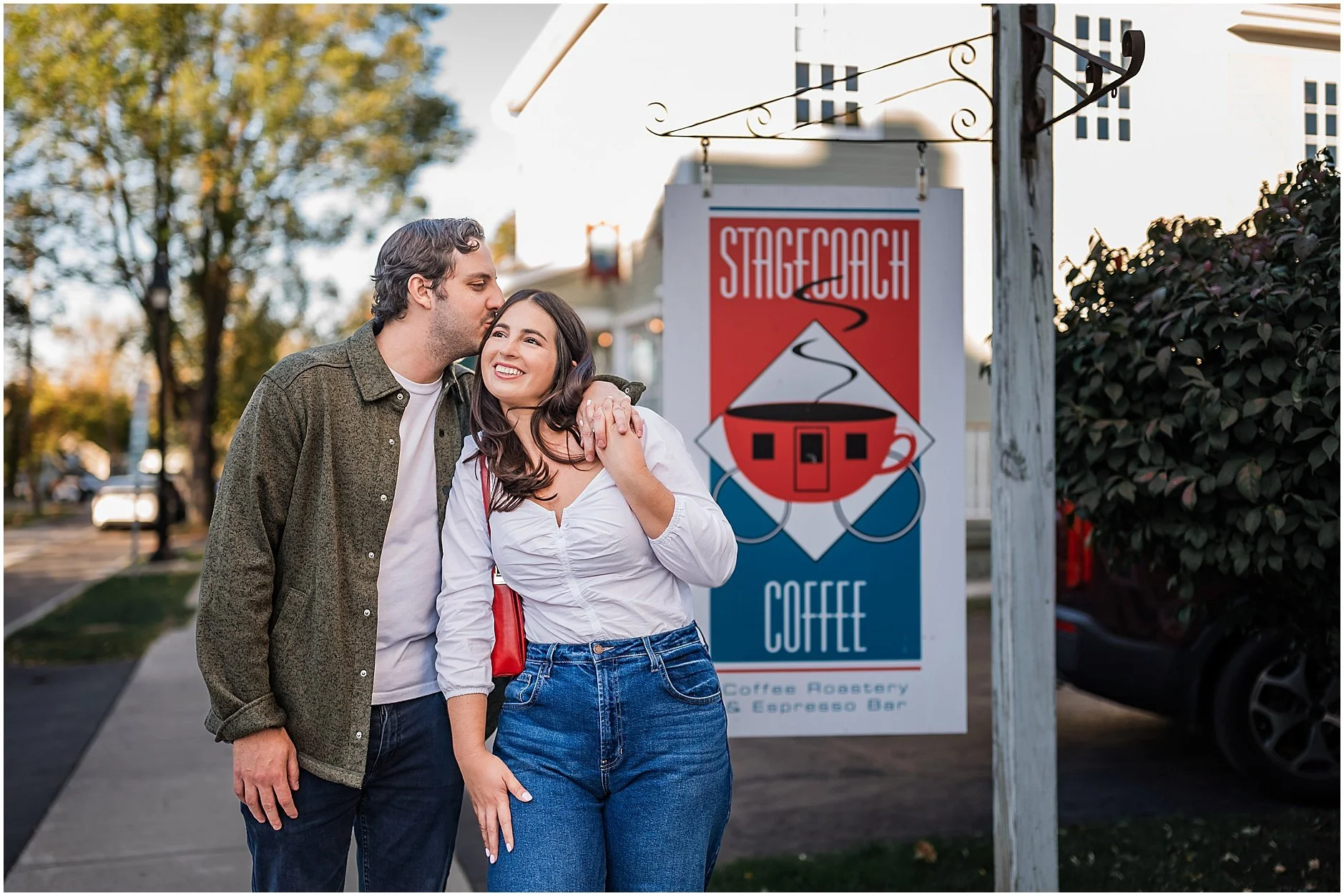 Engagement photo outside Stagecoach Coffee in downtown Cooperstown NY