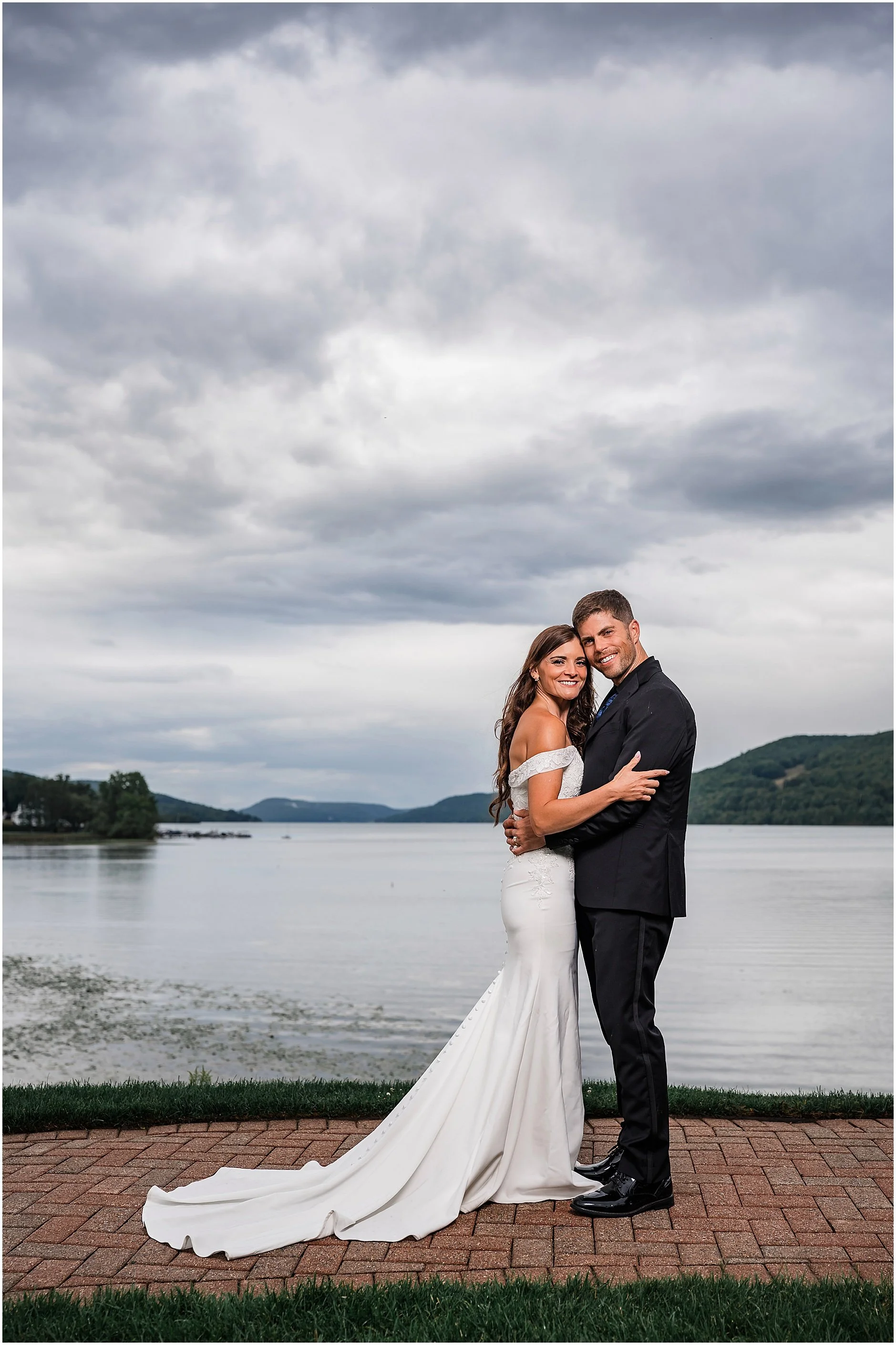 Couple standing together outside a timeless Upstate New York wedding venue.