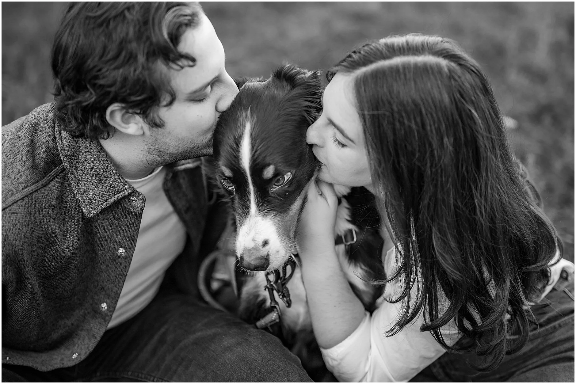 Playful engagement portrait including couple’s dog in Upstate New York
