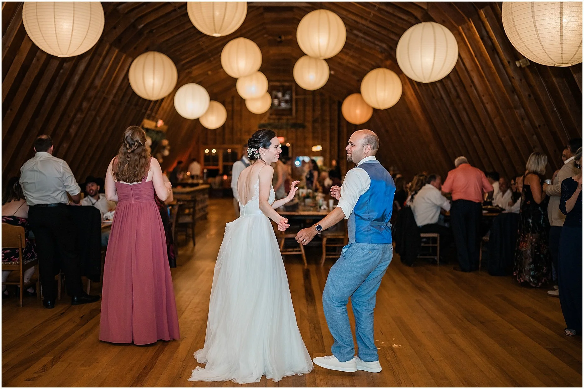 Bride and groom dancing together during their wedding reception in the Catskill Mountains at The Inn at West Settlement