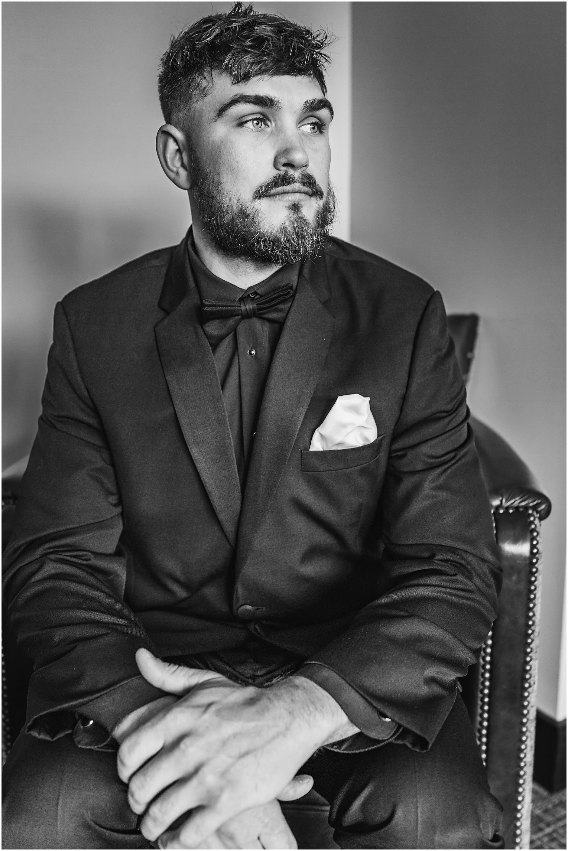 Black and white portrait of the groom at his spring wedding in Catskill, New York.