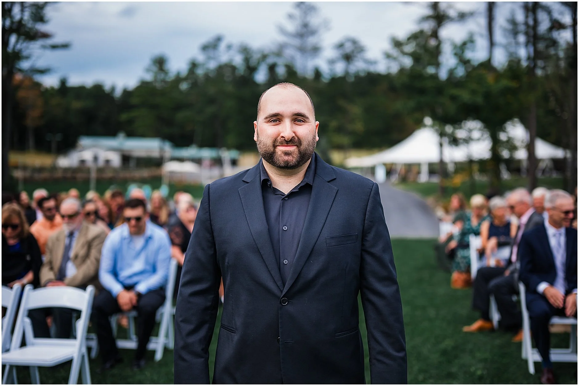 Groom walking down the aisle at The Rosemary at Spano Lake in Cooperstown